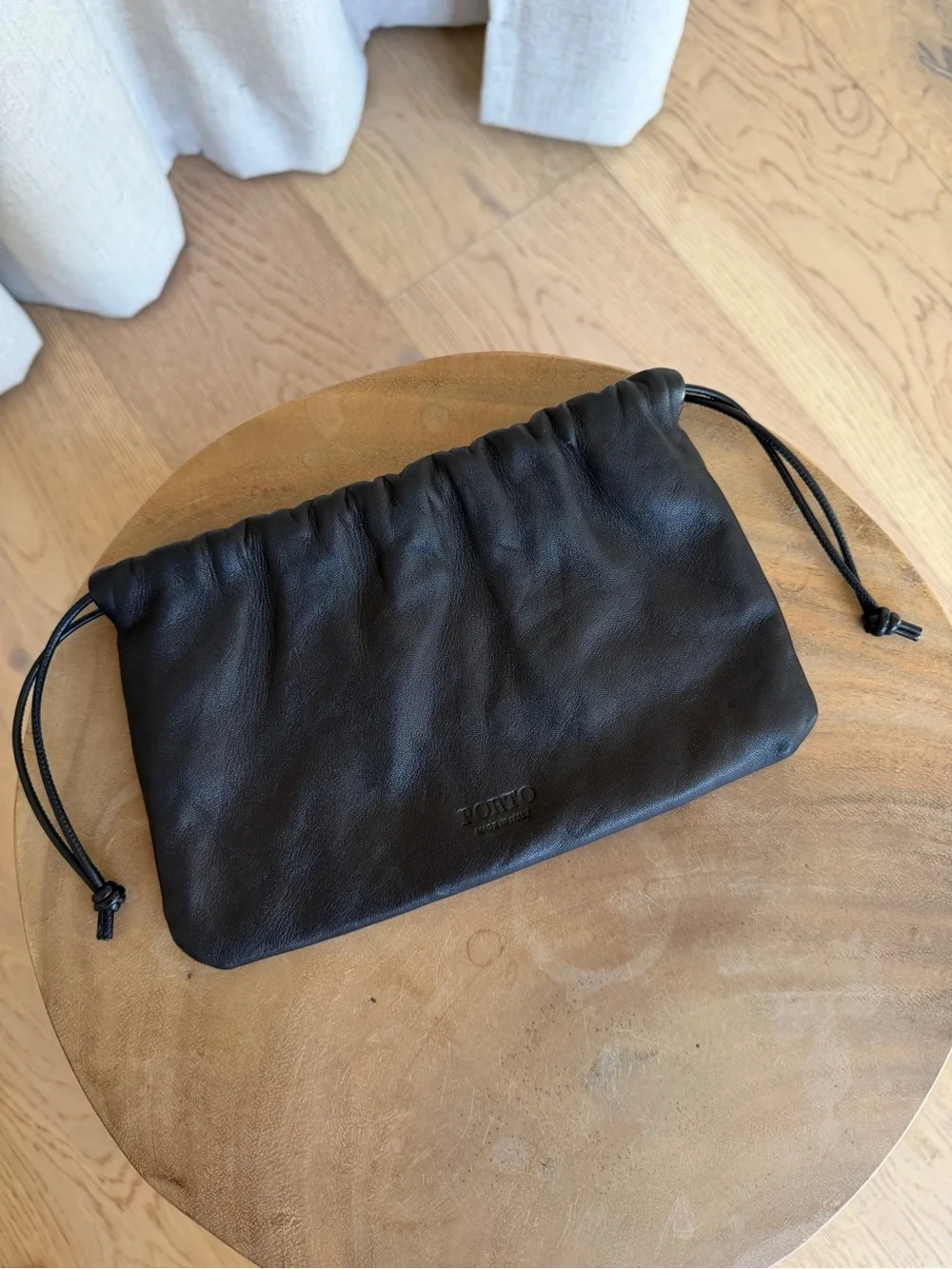 Porto Black Leather Drawstring Clutch